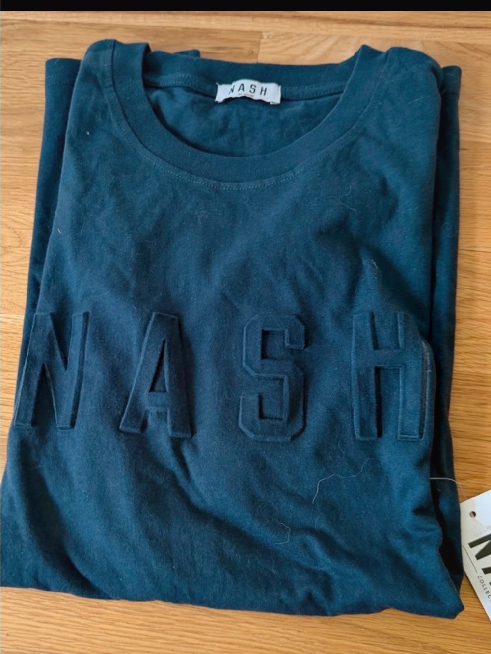 NASH Women's Black Short Sleeve Crewneck Tee with Tonal Raised Logo
